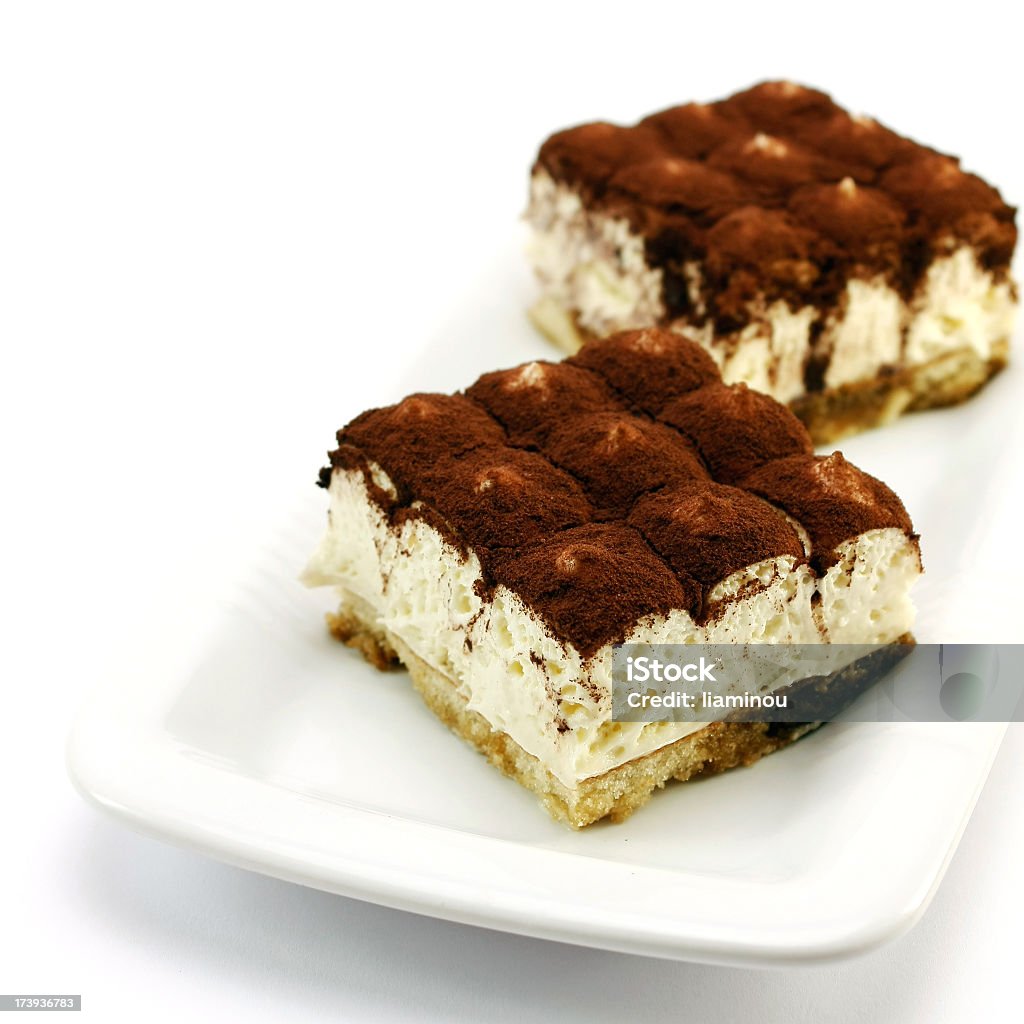 Food shot of two tiramisu cakes on a plate tiramisu dessert on a plate Tiramisu Stock Photo