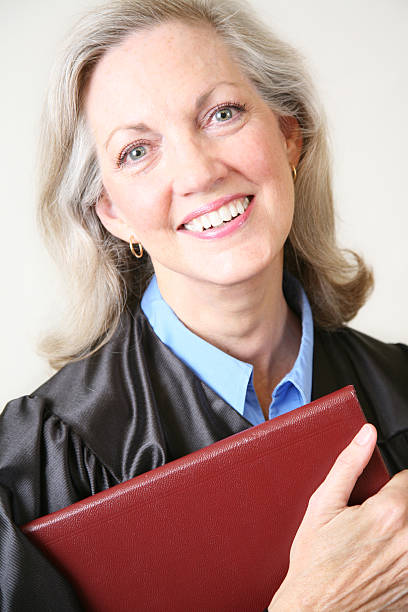 istock Smiling Adult Graduate Holding Her Diploma 173936813