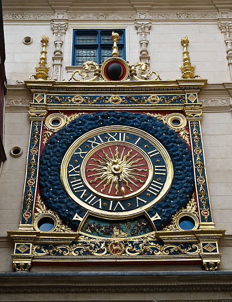 Big Clock The Gros Horloge is an astronomical clock (dating back to the16th century) though the movement is considerably older (1389). It is located in the Gros Horloge street. rue du gros horloge photos stock pictures, royalty-free photos & images
