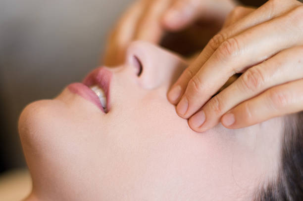 facial massage stock photo