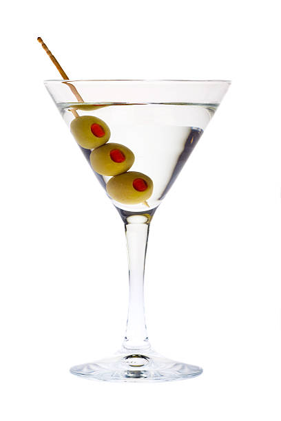 istock martini glass with green olive and toothpick isolated on white 173937732