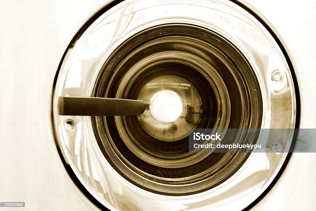 Metall washing machine front "Door from a public washing machine, toned image" Activity Stock Photo