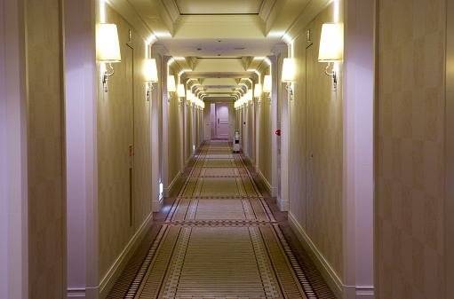 Long hallway in a hotel.