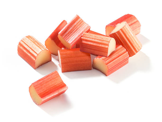 Rhubarb pieces "Rhubarb pieces. The file includes a excellent clipping path, so it's easy to work with these professionally retouched high quality image. Thank you for checking it out!" rhubarb stock pictures, royalty-free photos & images