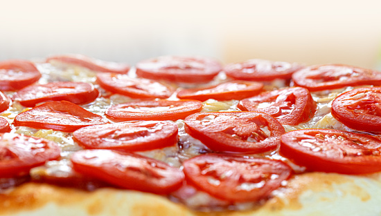vegetarian pizza tomatoes on pizza close up