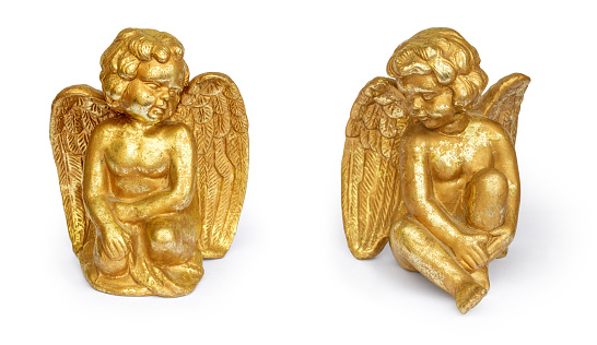retro golden little angel figurine isolated on white background with clipping path