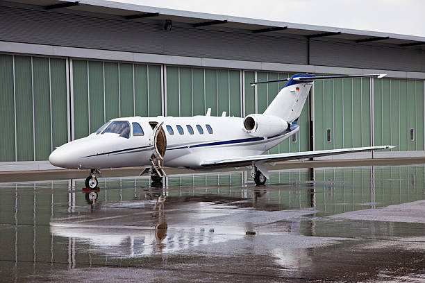 istock Private jet in front of hangar 173939286