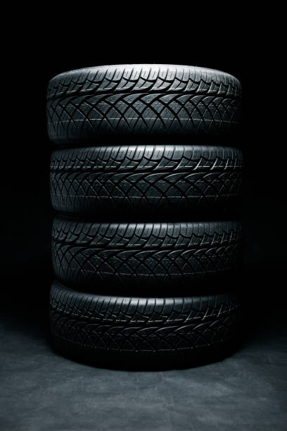 istock New tyres background. Car tyres close up 1739395742
