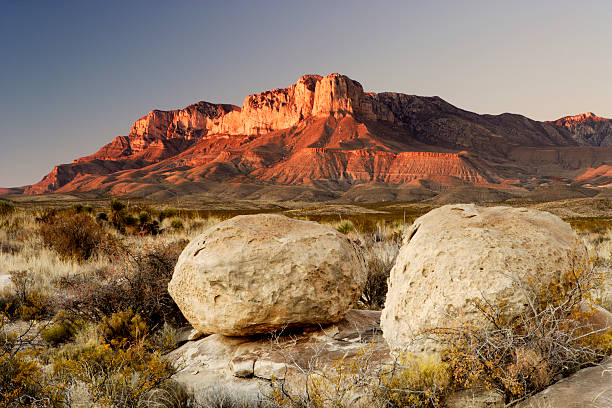 El Capitan illuminated by sunset light Sunset at Guadelupe Mountains National Park, Texas. texas mountains stock pictures, royalty-free photos & images