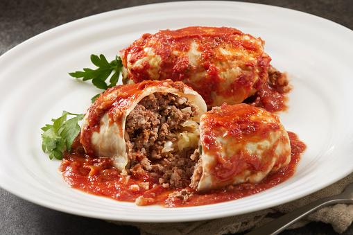 Homemade Stuffed Cabbage Rolls with Ground Beef, Rice, Onions and Tomato Sauce