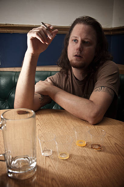 Man sitting in a restaurant or bar stock photo