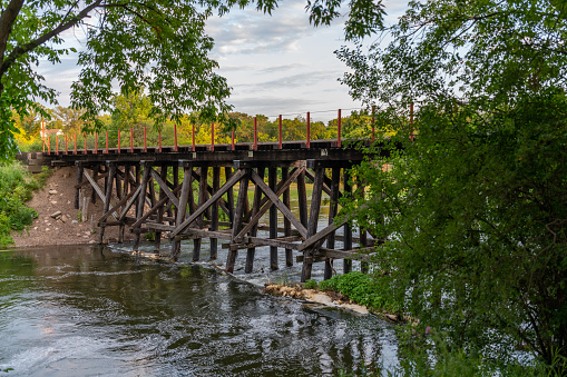 Wooden railroad bridge over the Otter Tail River in Fergus Falls, Minnesota.