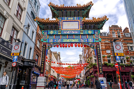 London England - May 29 2023: The Entrance to Chinatown in London England with The Ornate Gate