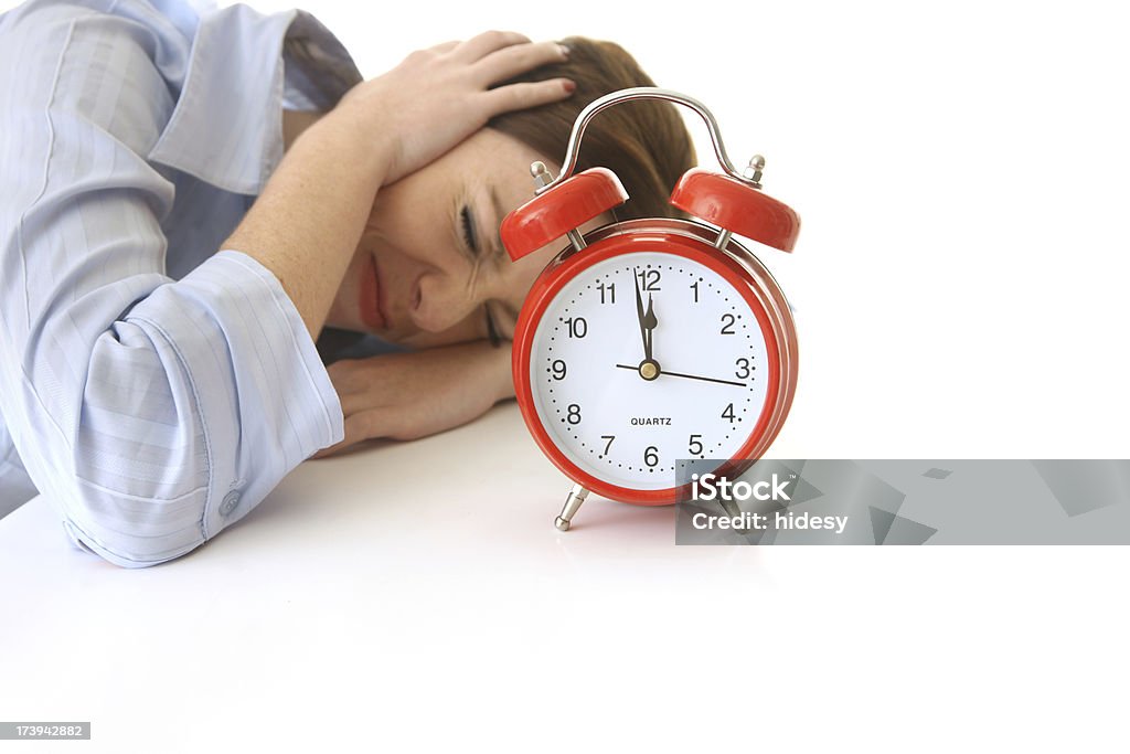 Business donna sonno attraverso allarme - Foto stock royalty-free di Adulto