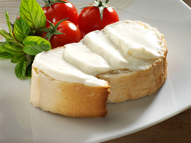 istock cream cheese on bread with tomato and mint 173942996