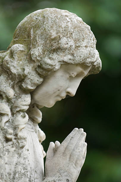 istock Gravestone statue of angel 173943269