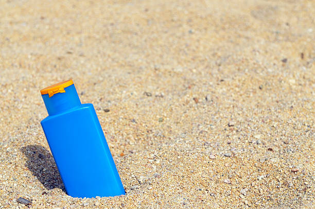 istock Suntan Lotion on the Sand.Copy Space. 173943670