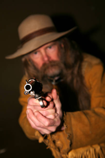 Cowboy Shooting His Pistol