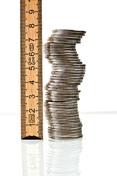 измерение ваши деньги - swedish coin стоковые фото и изображения