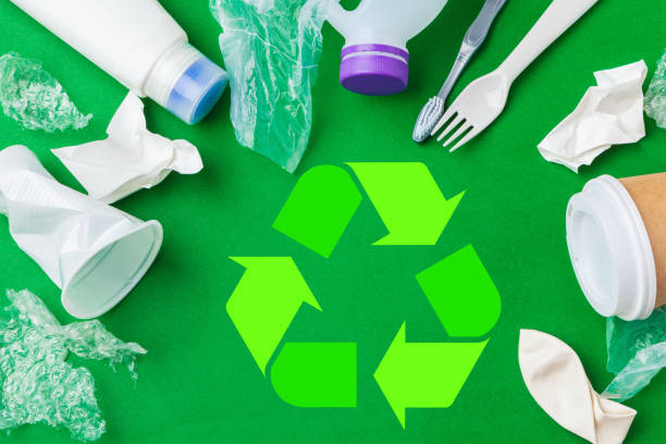 istock Eco concept with recycling symbol on table background top view 1739442303