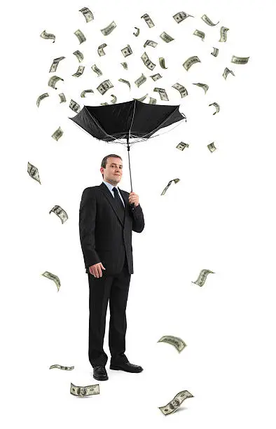 Photo of Businessman Under The Money Rain