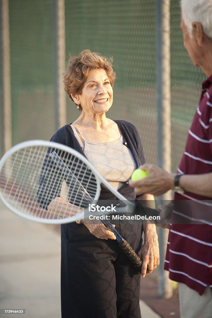 Senior Tennis Woman "Senior Tennis player smiling, View More:" Couple - Relationship Stock Photo