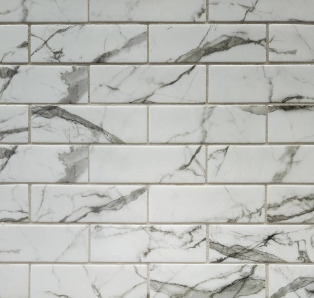 istock Glossy grey and white marble pattern subway title in bathroom or kitchen wall 1739465088