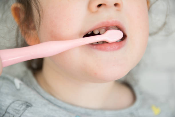 istock Child cleaning the teeth. 1739466179