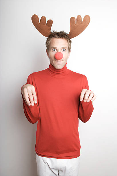 istock Holiday Red Nosed Reindeer Man Stands Ready 173947081