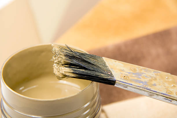 istock paint tin and brush in browns 173947084