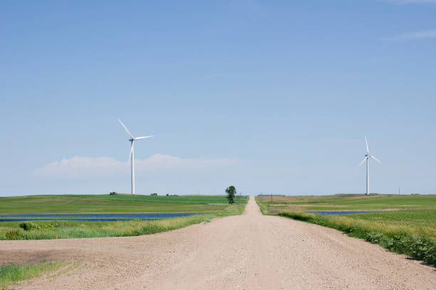 istock country raod and wind turbines 173947750