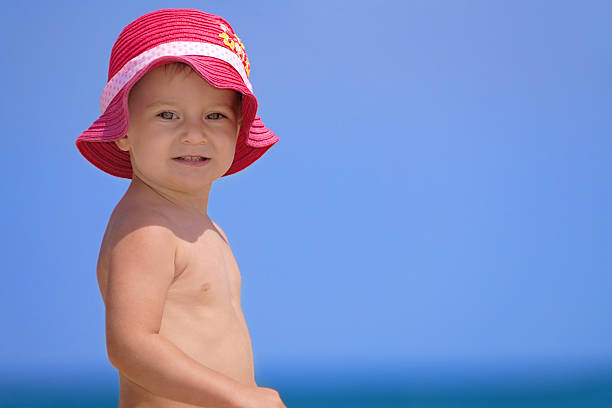 istock Baby girl on the beach 173947818