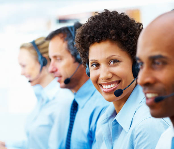 istock Female telephonist working with her colleagues 173948022