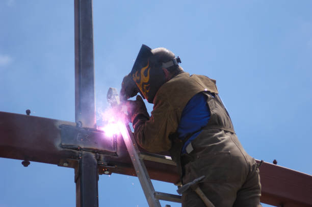 istock One Male Welder, on Ladder, Working With Steel 173948063