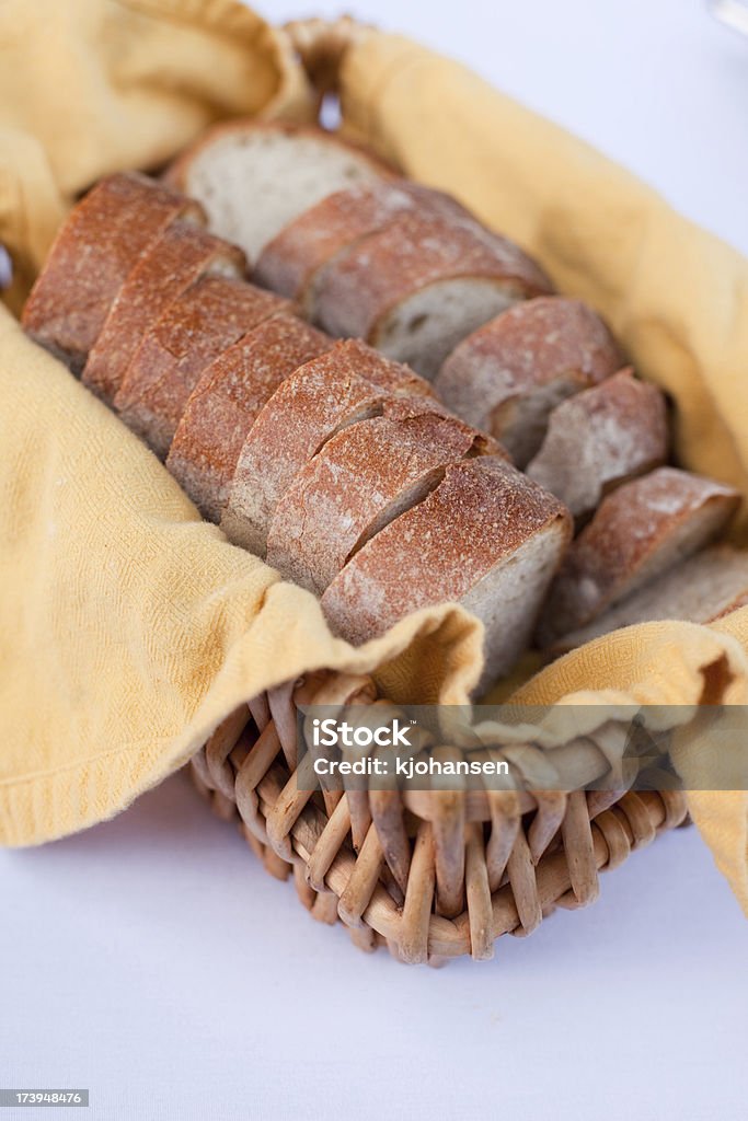 Fresh Baked Bread A loaf of sliced bread in a bread basket. American Culture Stock Photo