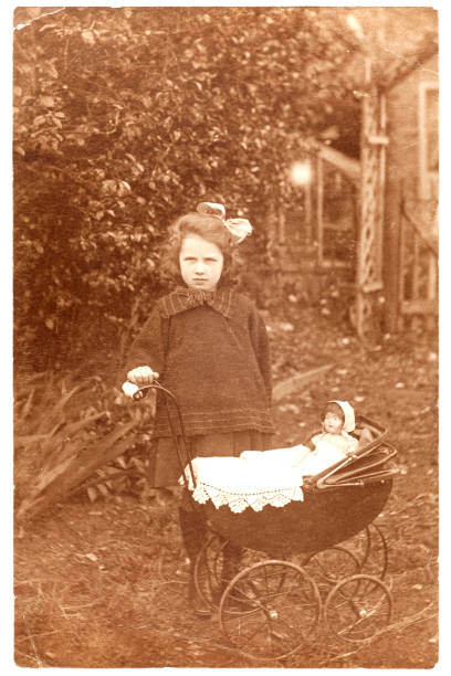 istock Girl in Garden With Pram 173949009