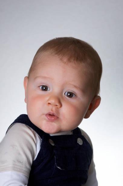 istock Ten month old boy portraits 173949178