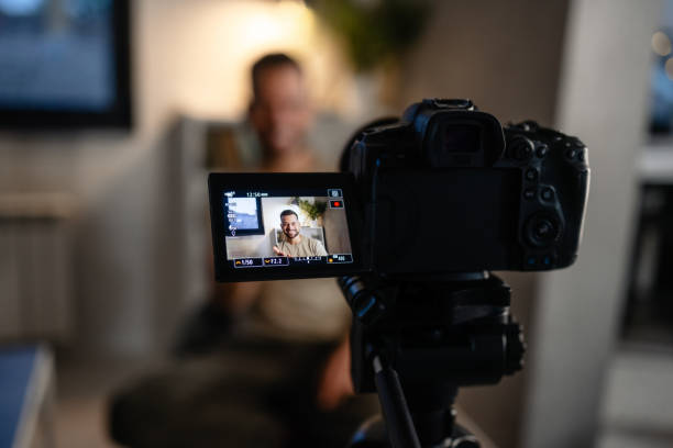 istock Camera on tripod indoors. Podcasting. 1739492629