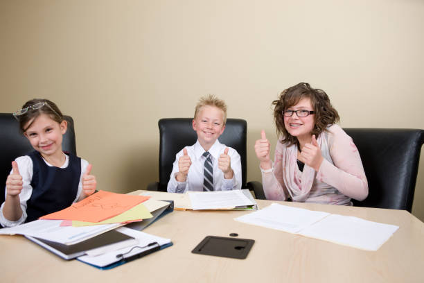 istock Young Business Leaders Give Thumbs Up 173950414