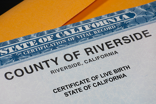 Lake Elsinore, CA, USA - October 14, 2023: Close up of the top of a birth certificate from the state of California