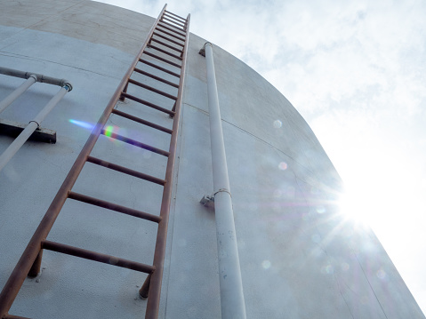 ladder climb the stairs tank water metal water industry tower outdoor steel construction step architecture building structure high factory storage white business tall container store oil equipment