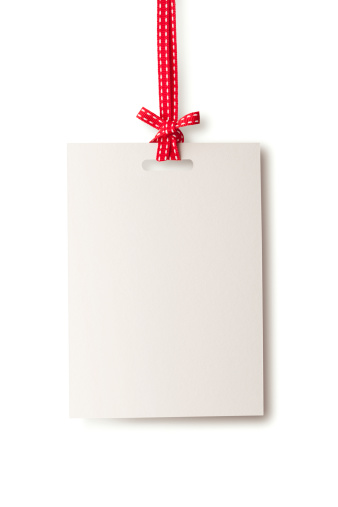 White blank card hanging from red ribbon. Isolated on a pure white background, absolutely no dot in the white area no need to cut-out e.g. can be dropped directly on to a white web page seemlessly.