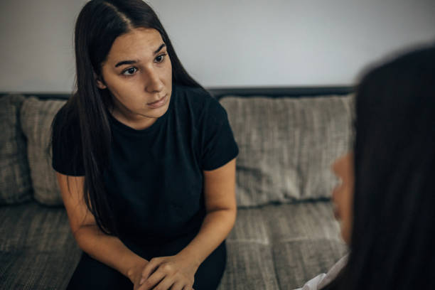 istock Two young beautiful women are having a difficult conversation 1739589859