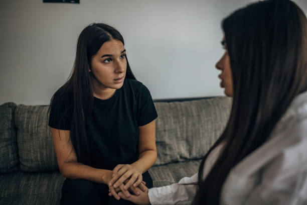 istock Two young beautiful women are having a difficult conversation 1739600115