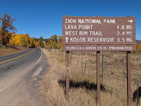 Side road and fence off Kolob Terrace Road in autumn near the turn-off to Lava Point in Zion National Park Utah below the Kolob Mountain Community in October 2023.