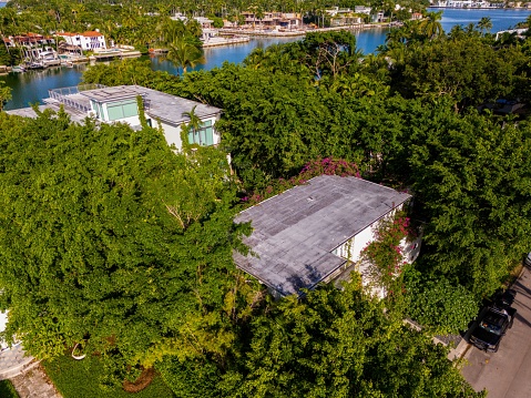 Miami Beach, FL, USA - October 6, 2023:  Aerial drone photo of a luxury waterfront mansion home on Allison Island Miami Beach Florida