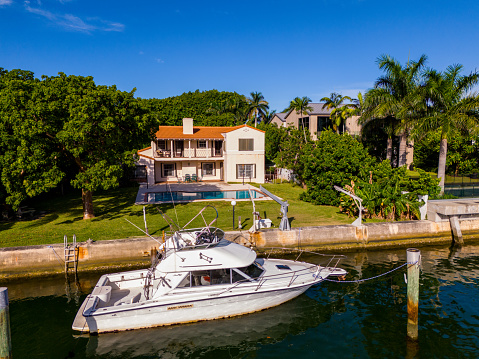 Miami Beach, FL, USA - October 6, 2023:  Aerial drone photo of a luxury waterfront mansion home on Allison Island Miami Beach Florida