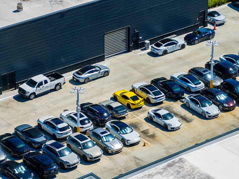Davie, FL, USA - October 15, 2023: Aerial drone photo Porsche West Broward a luxury automotive dealer