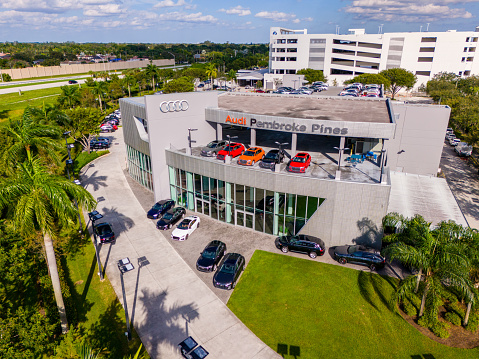 Pembroke Pines, FL, USA - October 15, 2023: Aerial photo Audi Dealership building in Pembroke Pines