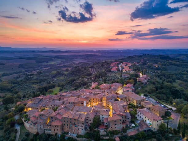 istock Castelmuzio at dusk, Tuscan town from drone 1739696450